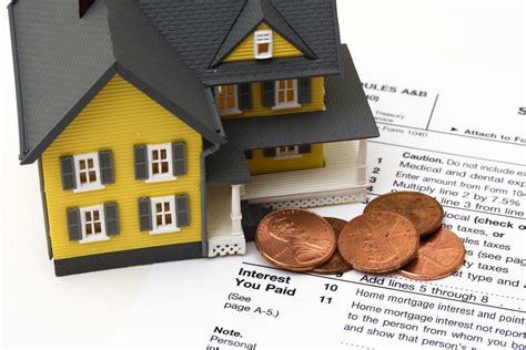 property taxes on a factory building are an element of: